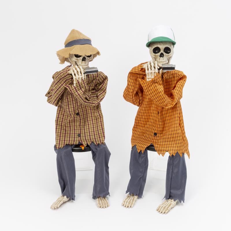 Gerson 38 in. Animated Skeleton Shelf Sitter Playing Harmonica Halloween Decor